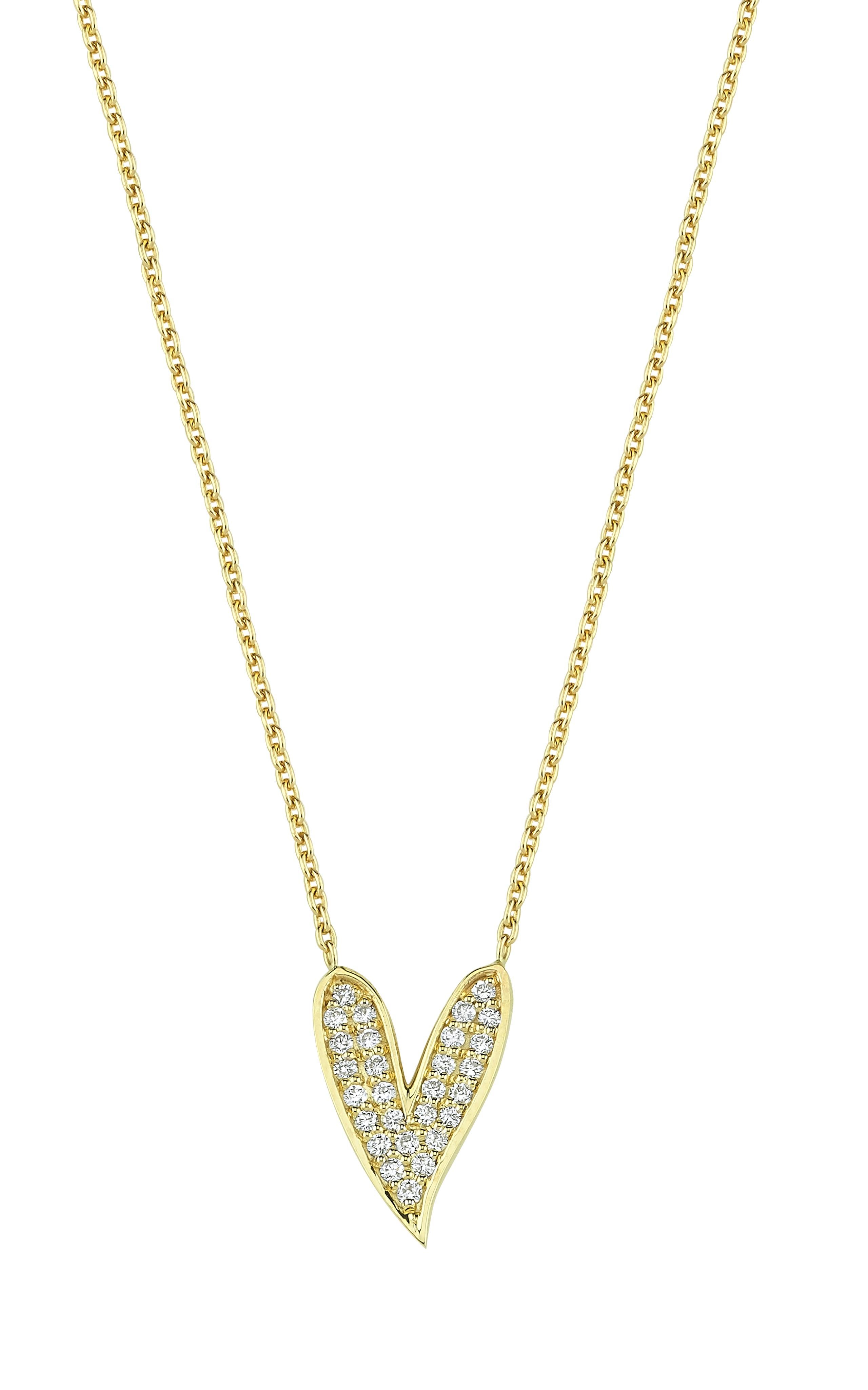 This beautiful dainty unique shaped necklace is with a little heart from designer's childhood drawing. 