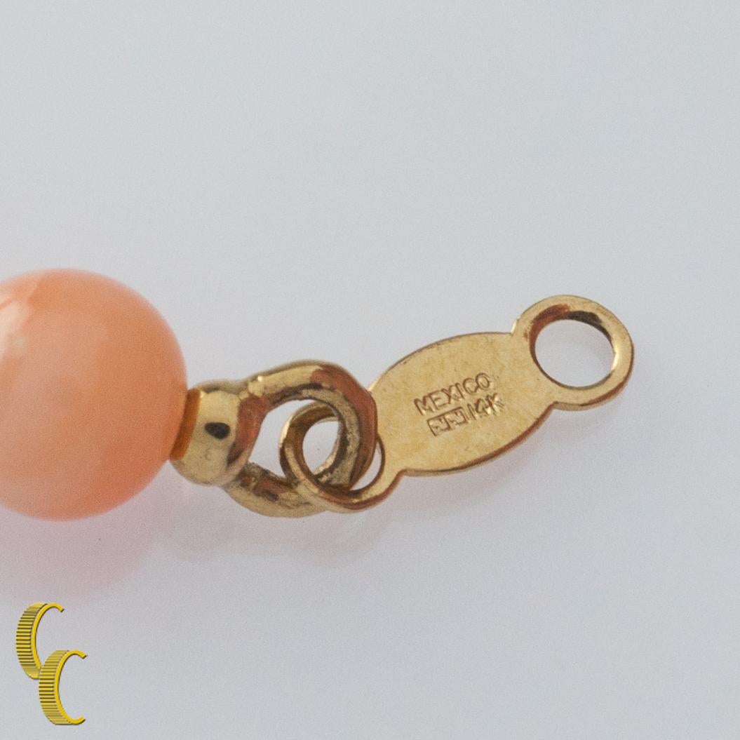 Modern 14k Gold and Coral Beads Bracelet with Lobster Clasp, Size 6.75 For Sale