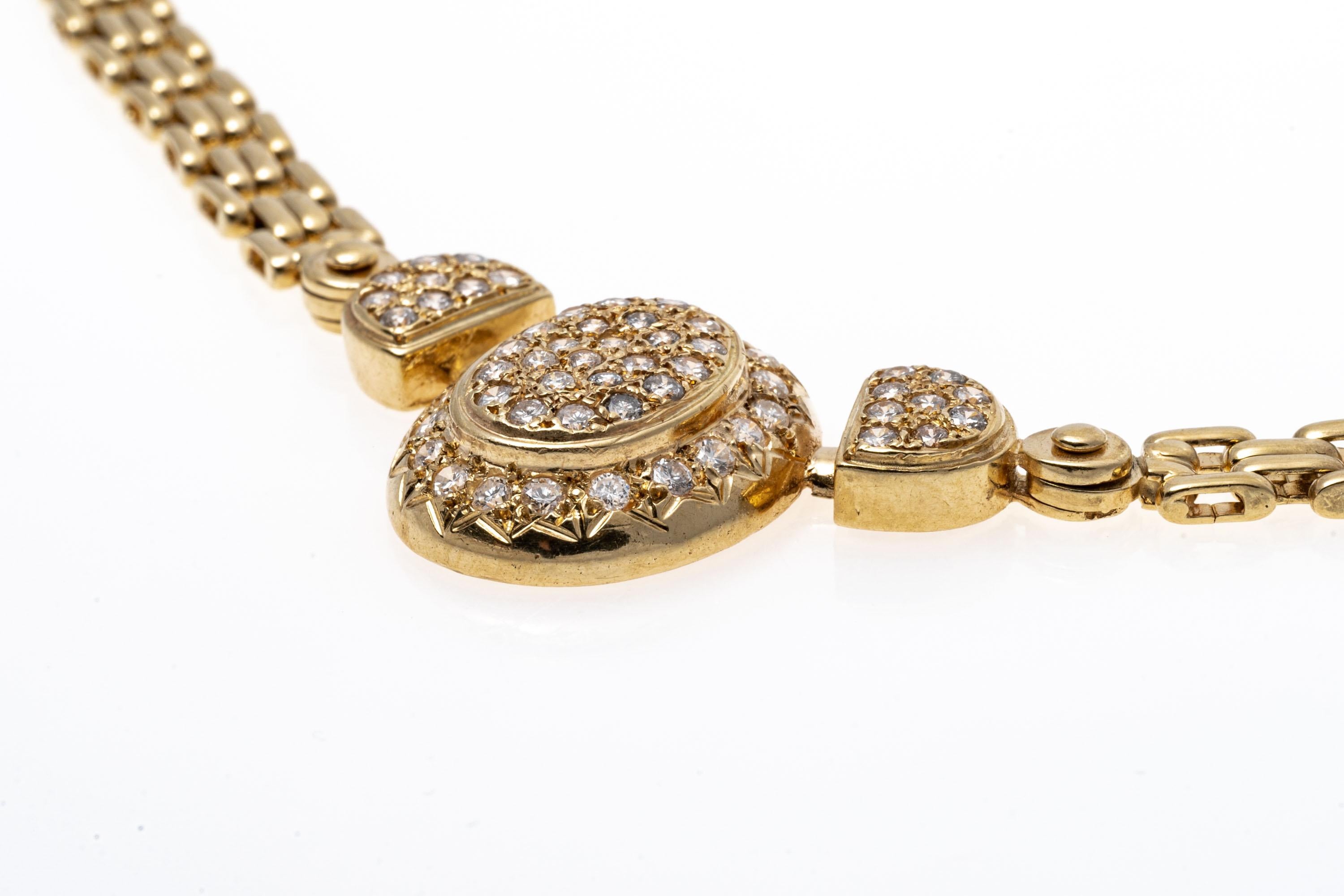 14K Gold And Diamond Italian Necklace. With a classic design this stylish necklace has polished yellow gold links leading to a centered pendant set with diamonds for a brilliant shine. Diamonds are approximately 0.8 TCW. Hinged box style