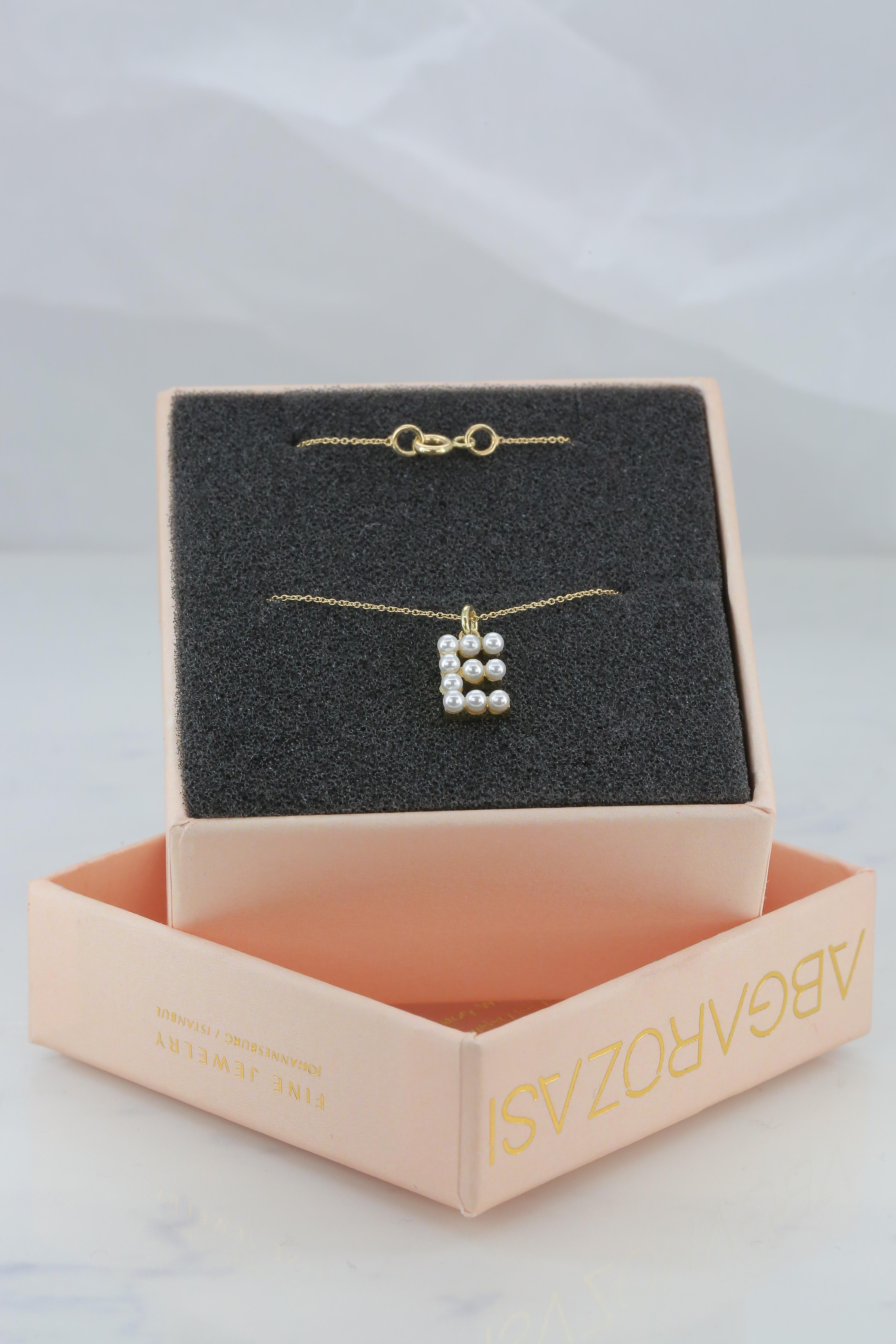 letter e necklace gold