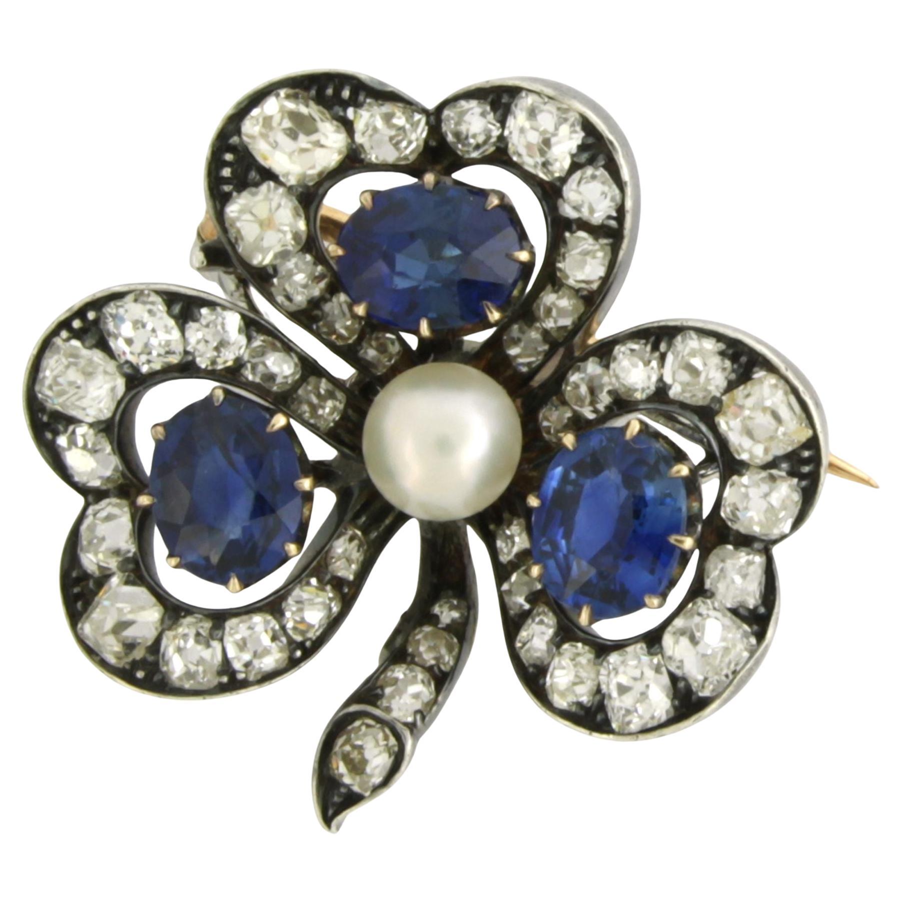 Spilla in oro e argento 14k a forma di giglio con perla, zaffiro e diamanti in vendita