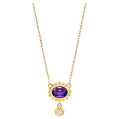 Ciondolo a forma di anemone in oro 14k con ametista e diamante