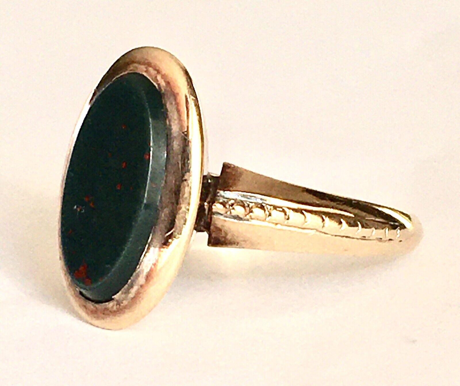 14K GOLD ANTIQUE VICTORIAN BLOODSTONE RING 

Over 100 years old in excellent condition considering its age  

Finger Size 5.5 
14 karat yellow gold Victorian era Bloodstone lady's ring, 6 mm by 11.5 mm flat top bloodstone, finger size 5.5, weighting