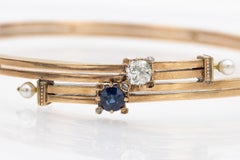 14k Gold Art Nouveau bracelet with diamond and sapphire.
