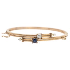 14k Gold Art Nouveau bracelet with diamond and sapphire.