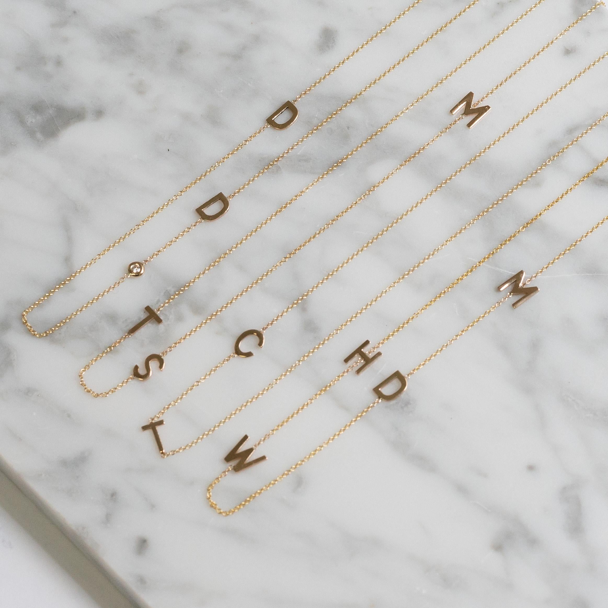 14 Karat Gold Asymmetrical Initial Necklace, M For Sale 1