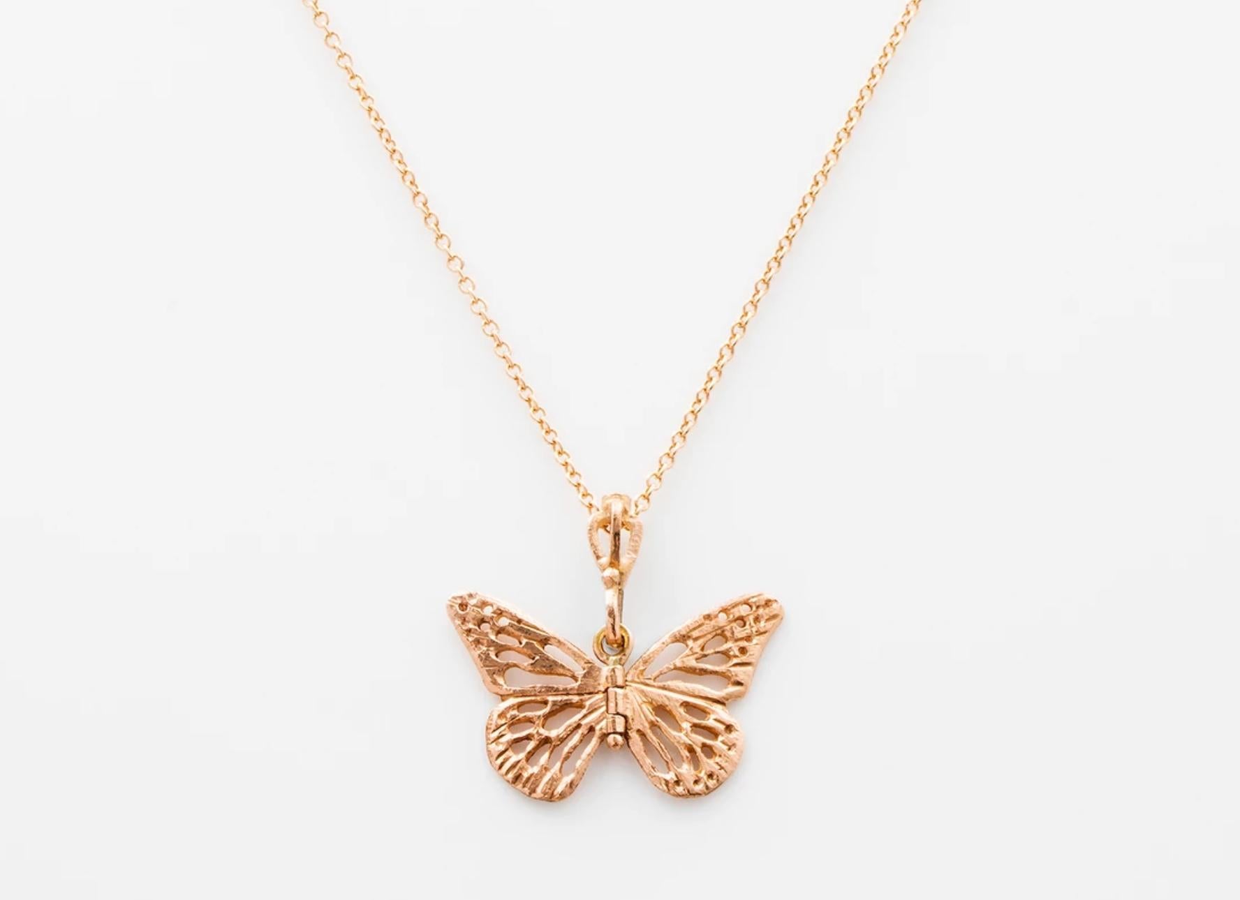 James Banks's signature butterfly necklace features a Baby Monarch species butterfly with a hinge at the center to allow movement of the wings, set in 14k Rose Gold with a lace cut out design and hung on a 14k Rose Gold Chain with a secure clasp