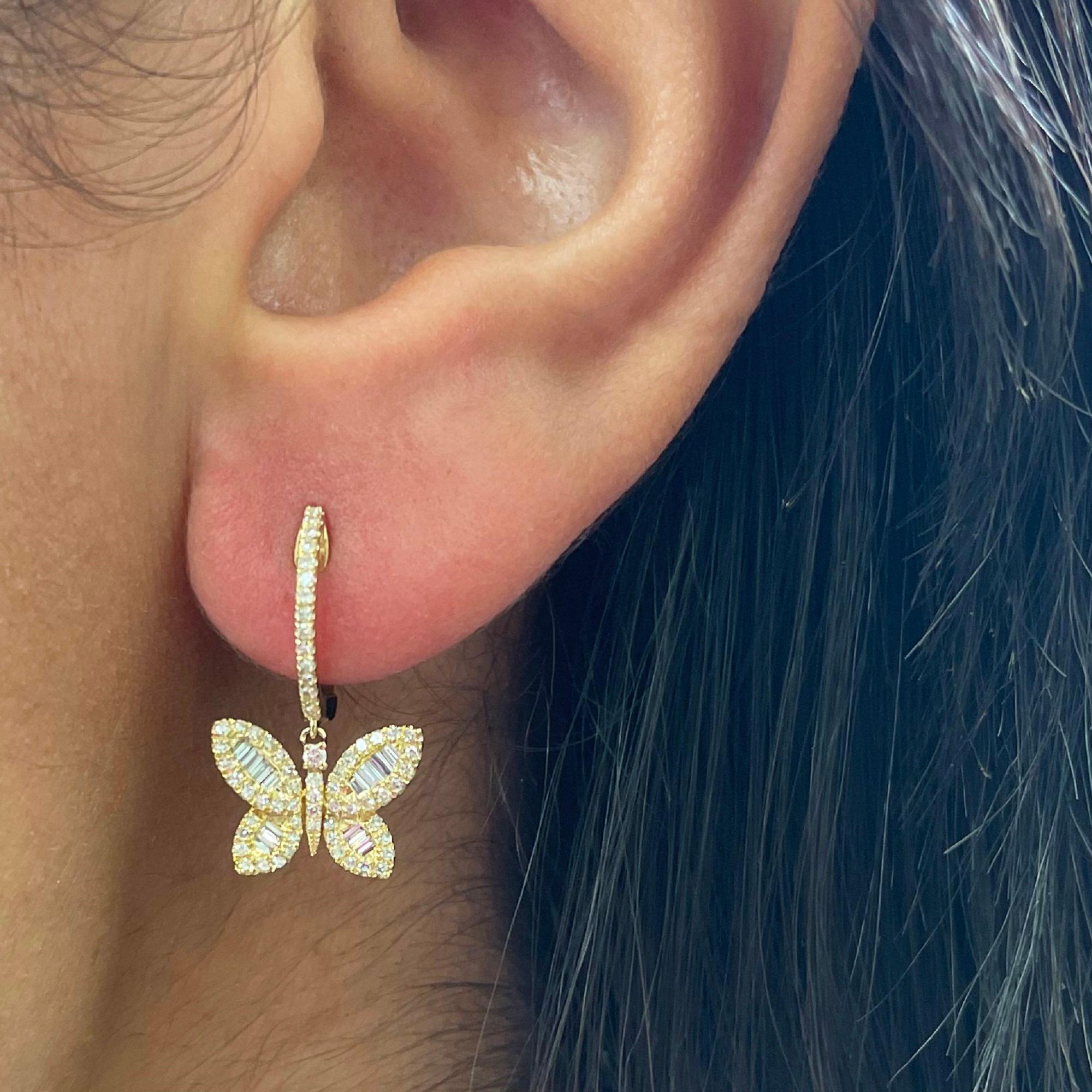 14k Gold & Baguette Diamond Butterfly Dangle Earrings

Earring Drop: 1 inch
Baguette Diamond Weight: 0.19 ct.
Baguette Diamond Count: 26
Round Diamond Weight: 0.67 ct.
Round Diamond Count: 26
Gold Weight: 2.6 grams (approx.)
This piece is perfect