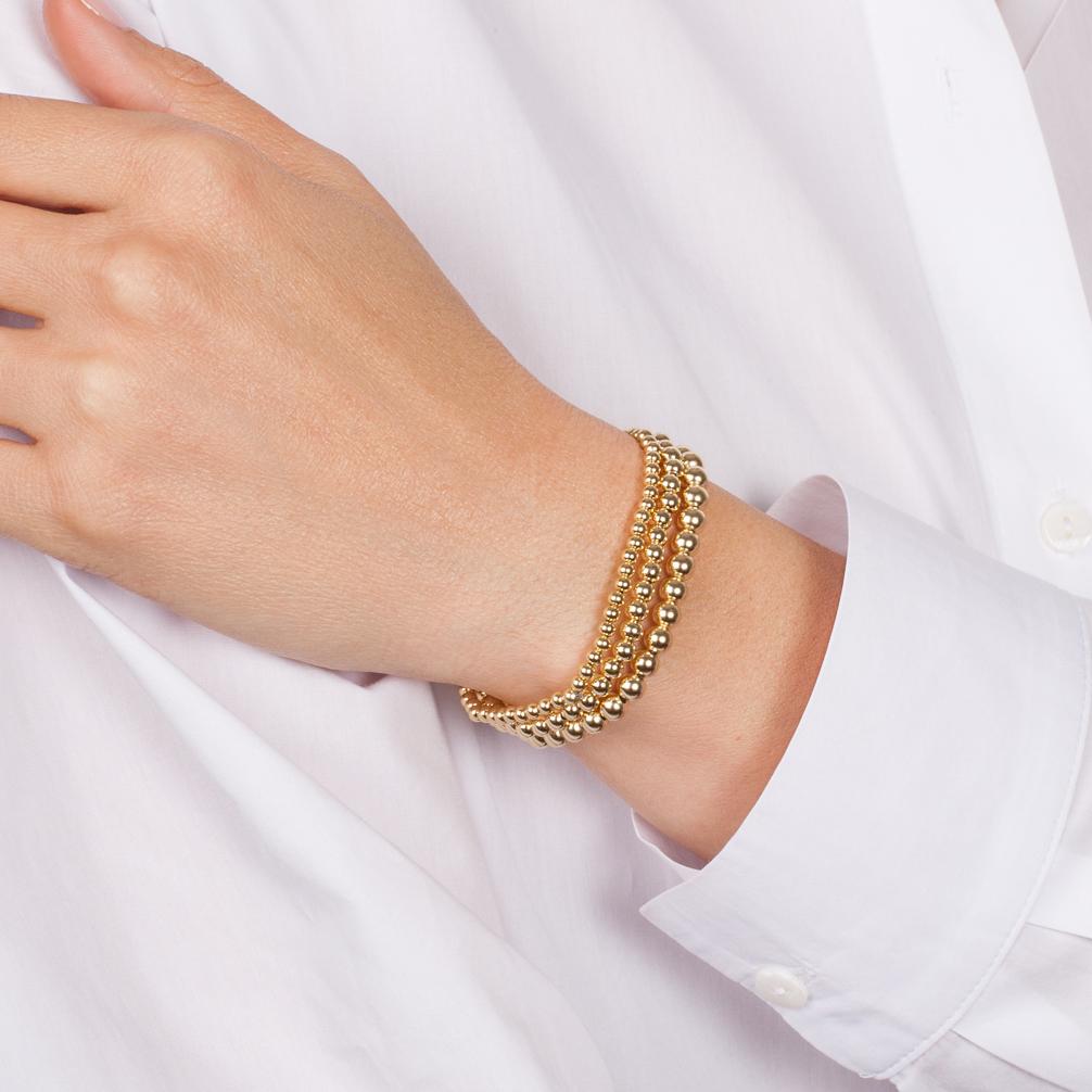 Part of our bead collection, Includes a 3mm, 4mm and 5mm bead bracelet to create the perfect stack. With an elastic stretch fit, wear it up or down individually or stacked with your other fine and fashion bracelets for the perfect arm party.

Made