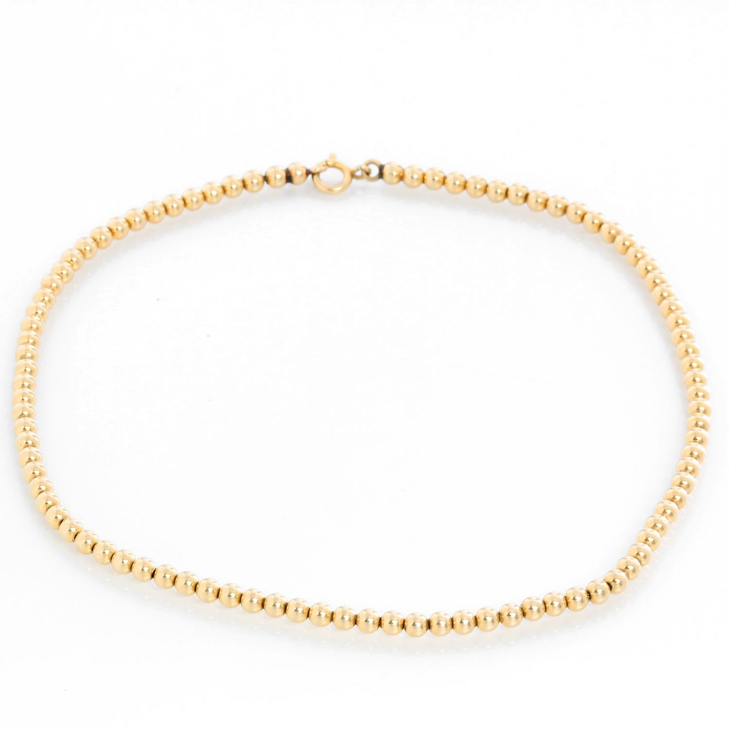 14K Gold Bead Necklace - 14K Yellow gold bead necklace. Measures 16 inches. Total weight 9.7 grams. 