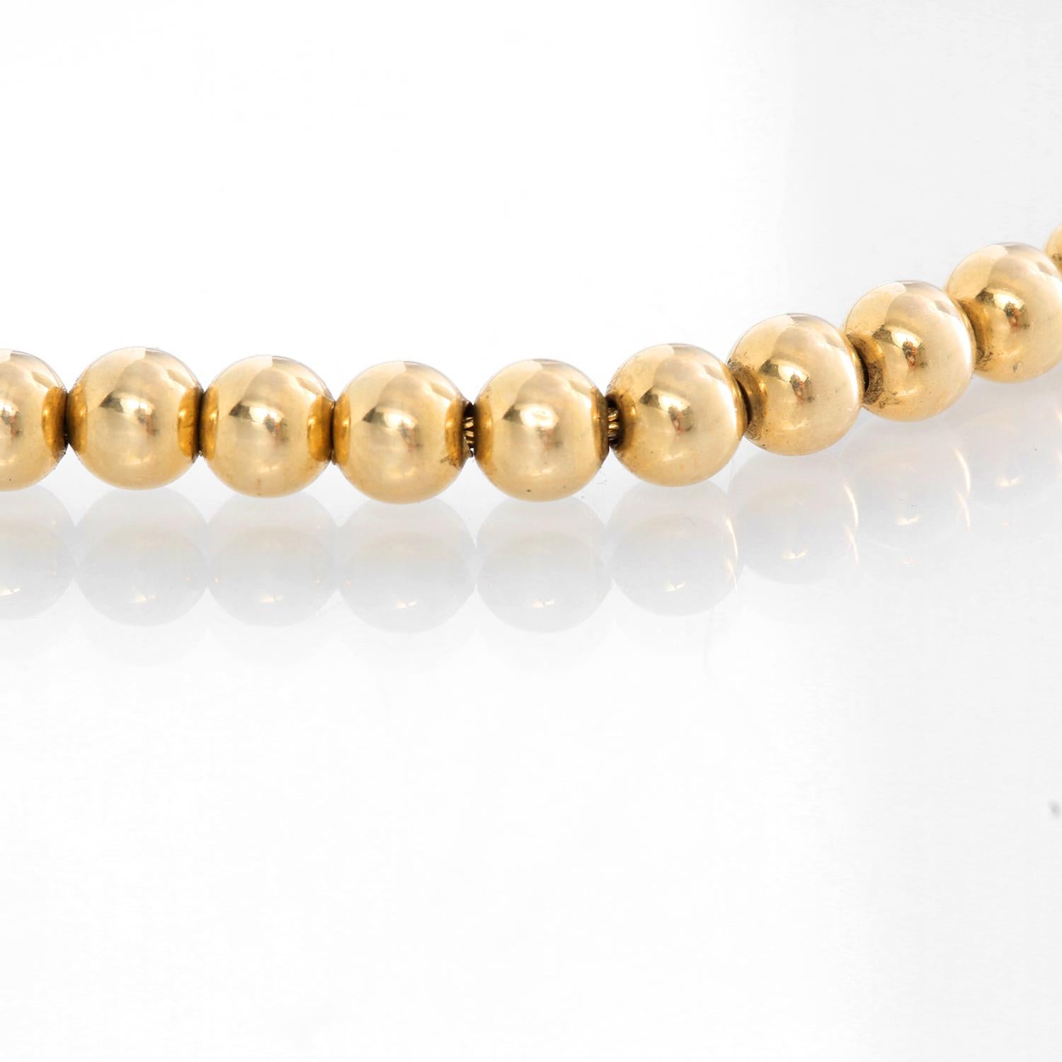14 kt gold bead necklace