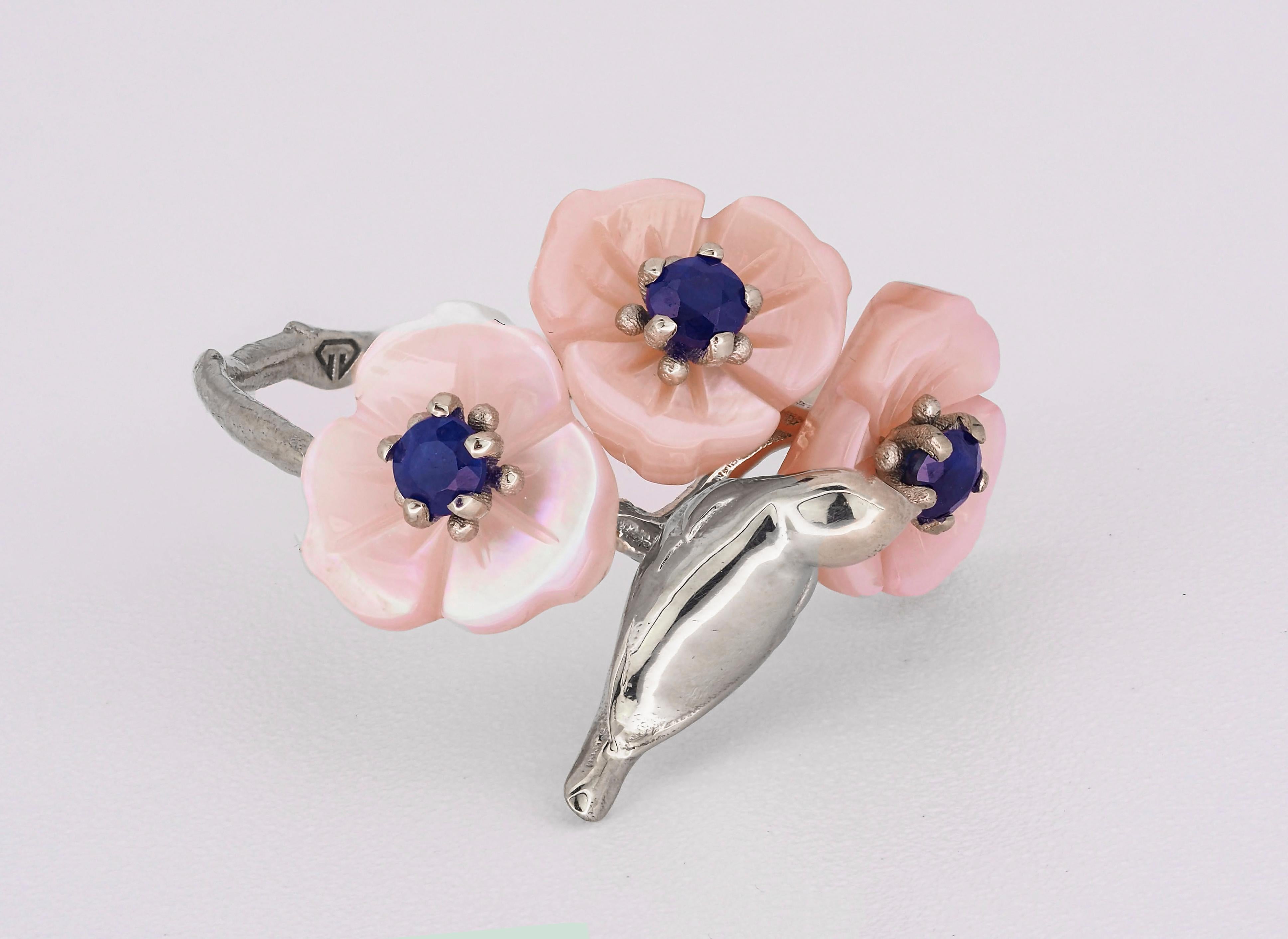 14 kt solid gold bird on branch ring with natural sapphires and carved mother of pearl flowers. September birthstone.
Metal: 14k solid gold (gold color you can choose)
Weight: 2.45 g.
Bird size: 11.4 x 4 mm.
Gemstones: 3 natural sapphires, color -