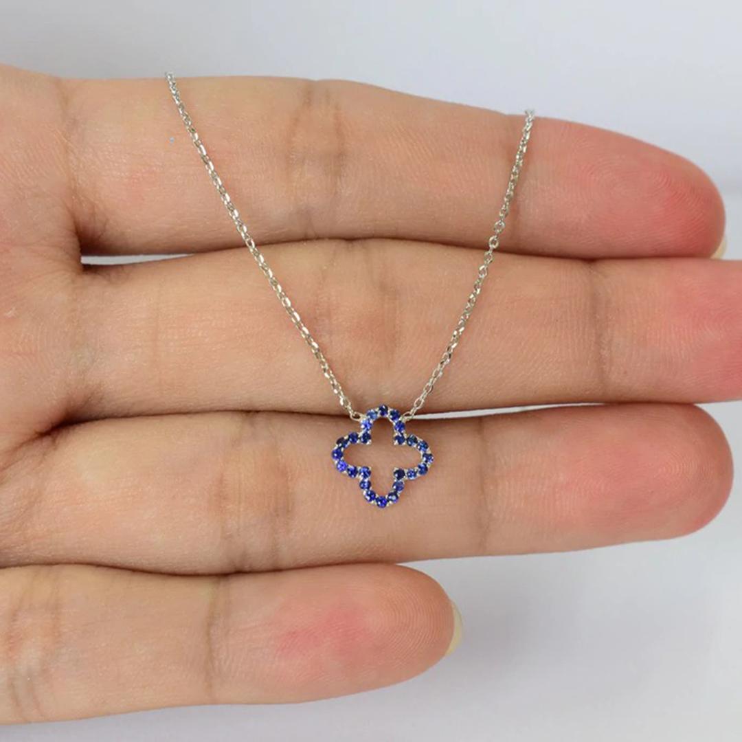 Blue Sapphire Clover Necklace is made of 14k solid gold available in three colors, White Gold / Rose Gold / Yellow Gold. 

Beautiful little minimalist necklace is adorned with natural AAA quality Blue Sapphire Gemstones. Perfect for wearing by