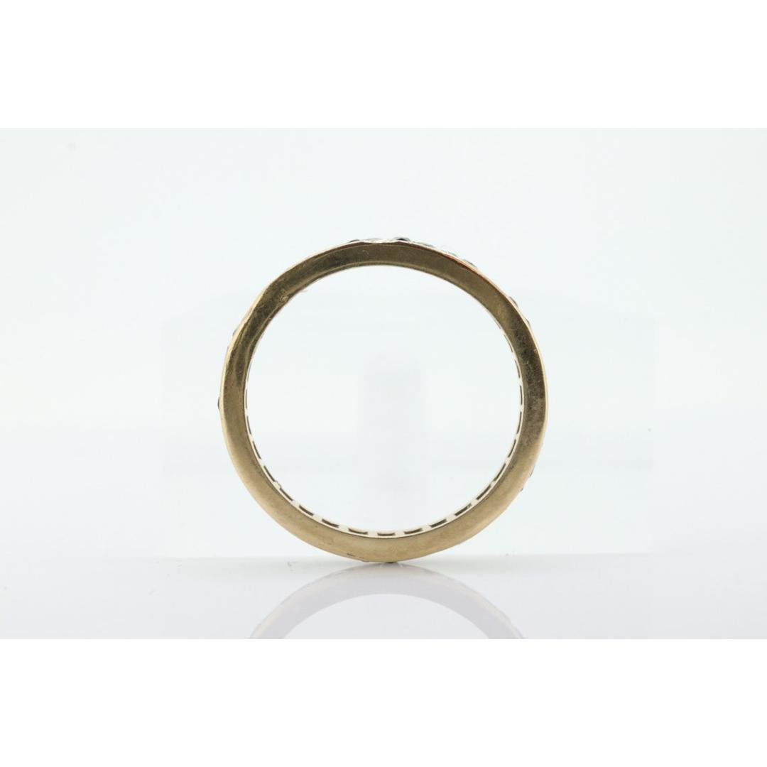 Vintage from the 1980s
Materials: Gold
Gemstone: Sapphire
Gem color: Blue
Band color: Yellow
Style: Minimalist
Blue Sapphire Full Eternity Band.

Channel set Princess cut sapphires.

Details:
Sapphires 1.5mm width
2mm band width
1.0grams total
sz5.5