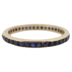 Bracelet fin en or 14k avec saphir bleu. Thin Channel Set Princesse
