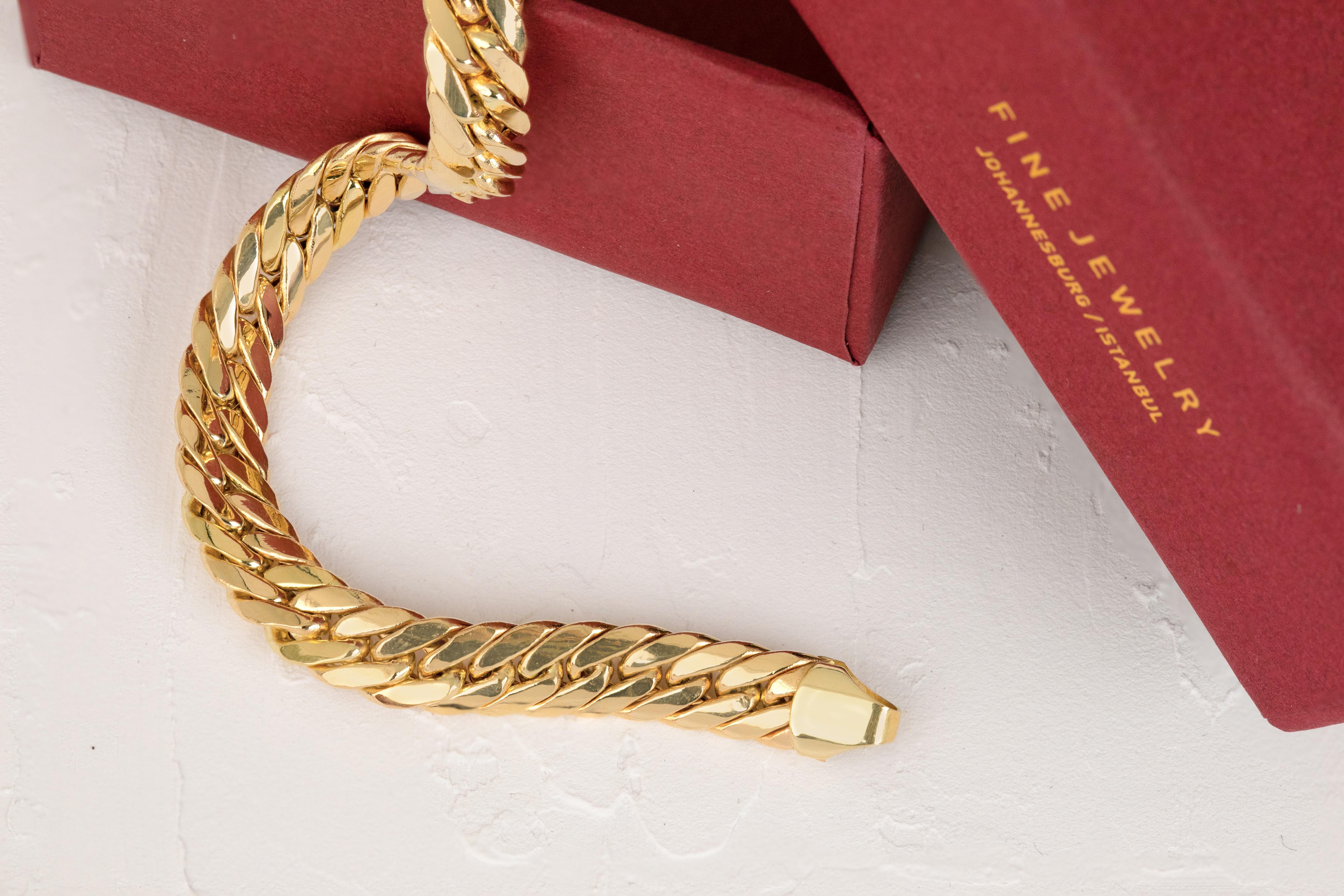 Contemporary 14k Gold Bracelet Gourmette Chain and Channel Lock Model Bracelet For Sale