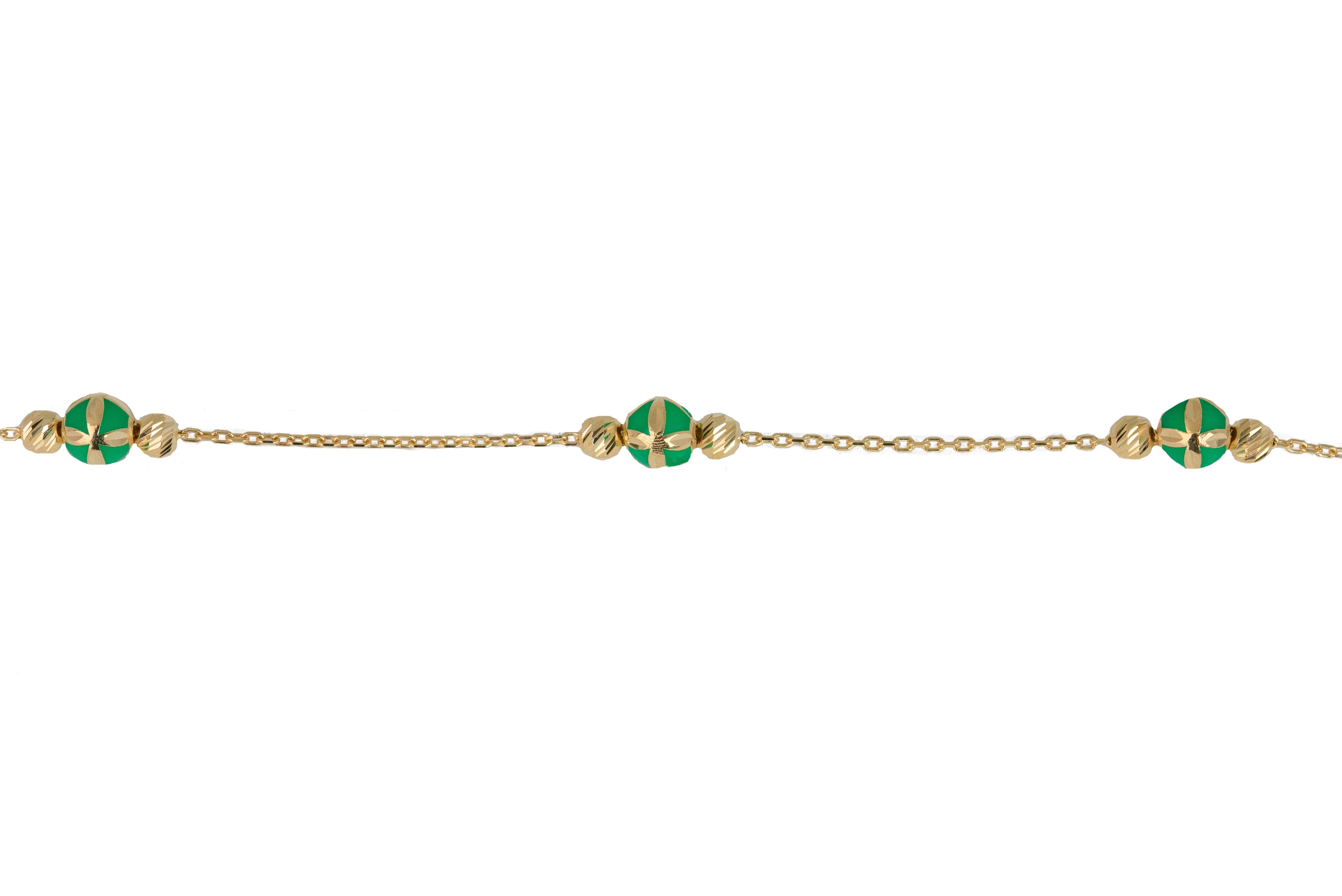 gold and green bracelet