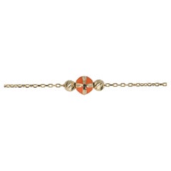 Bracelet en or 14 carats émaillé orange et modèle de collection Dorica