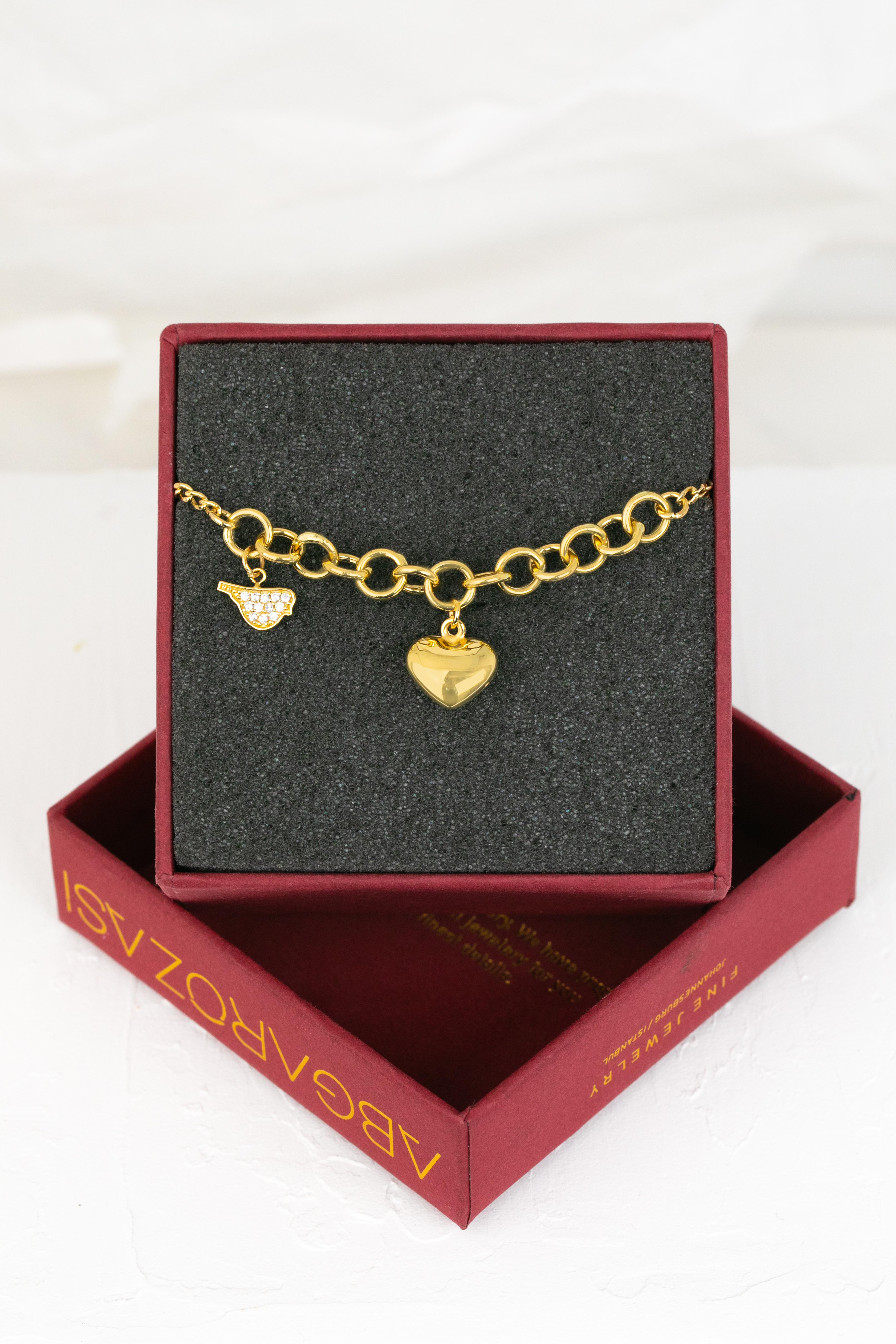 14K Gold Bracelet with Bold Chain, 14k Gold Chain Bracelet, Heart and Bird Model Sembol Bracelet delicate bracelet created by hands from chain to the stone shapes. Good ideas of dainty bracelet or stackable bracelet gift for her.

This bracelet was