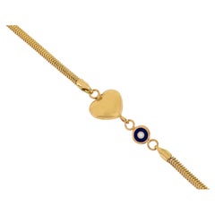 Armband aus 14 Karat Gold mit Kettenarmband, 14 Karat Gold-Emaille und Herzsymbol