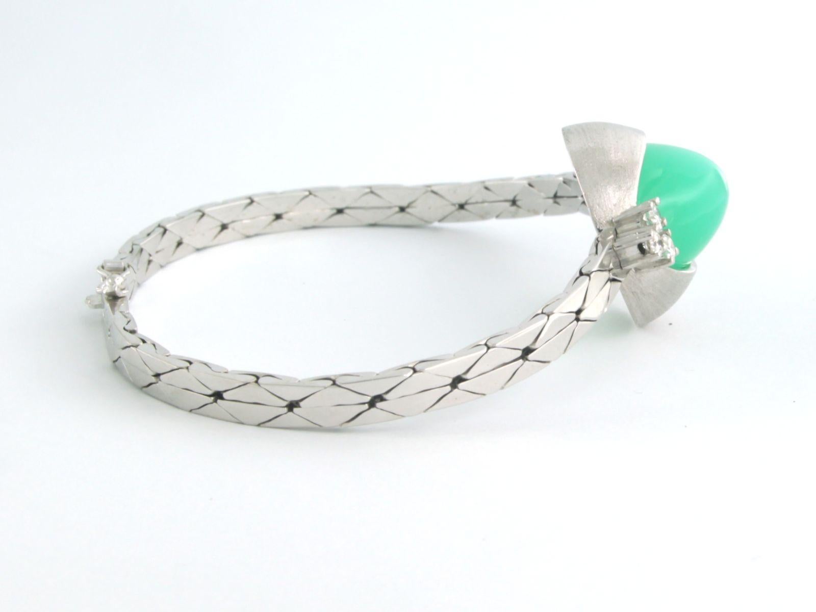 Bracciale in oro bianco 14k con crisoprasio e diamanti taglio brillante fino a 0,30 carati - F/G - VS/SI - lunghezza 17,5 cm

Descrizione dettagliata:

Il bracciale è lungo 17,5 cm, largo 4,0 mm e alto 1,2 cm.

Il centrotavola è largo circa 2,8 cm e