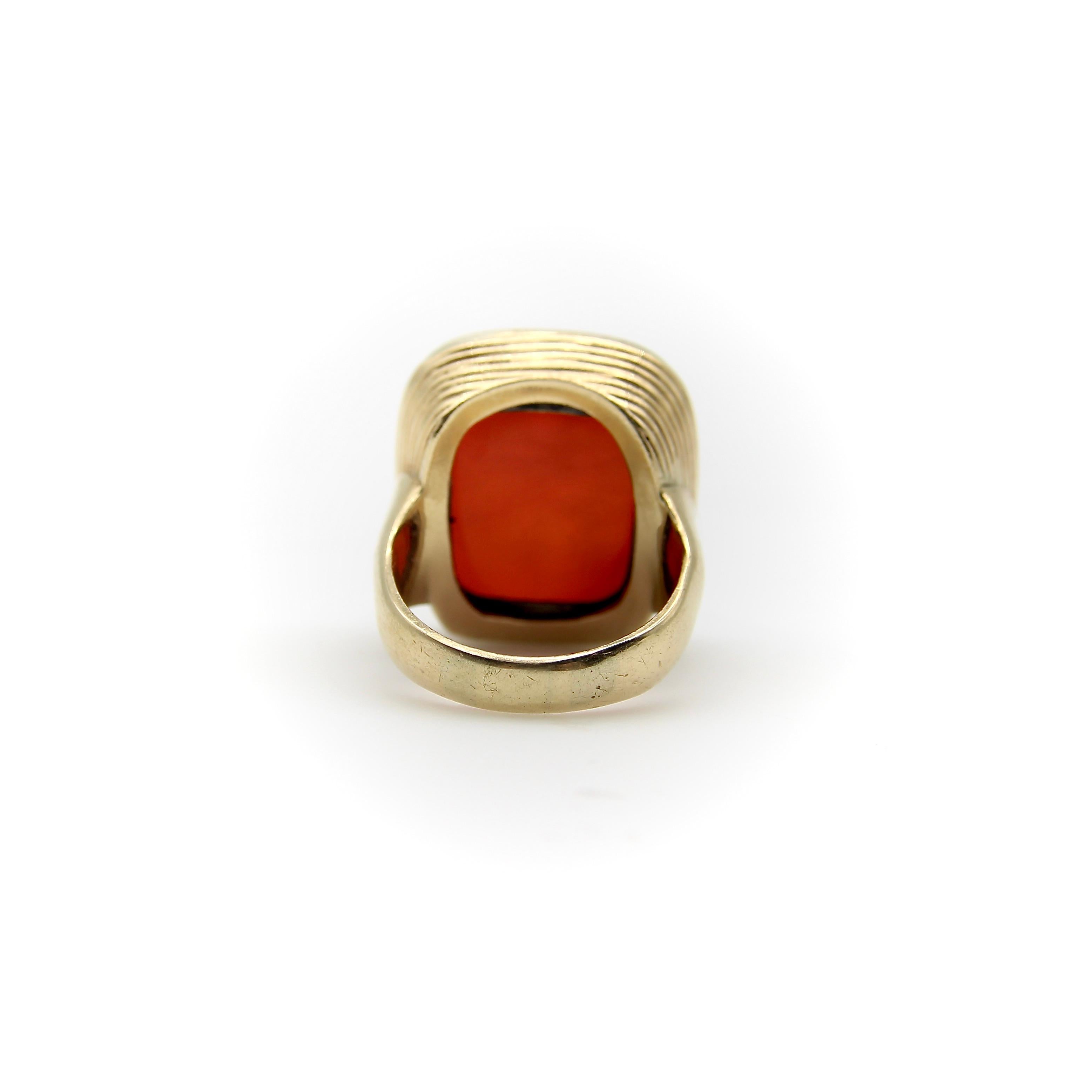 Circa the 1860’s, this 14k gold carnelian intaglio ring contains a family crest with amazing details. Sitting atop a shield is a winged griffin holding a flower in its mouth. As if the artist wanted you to see the griffin up close, the next image is