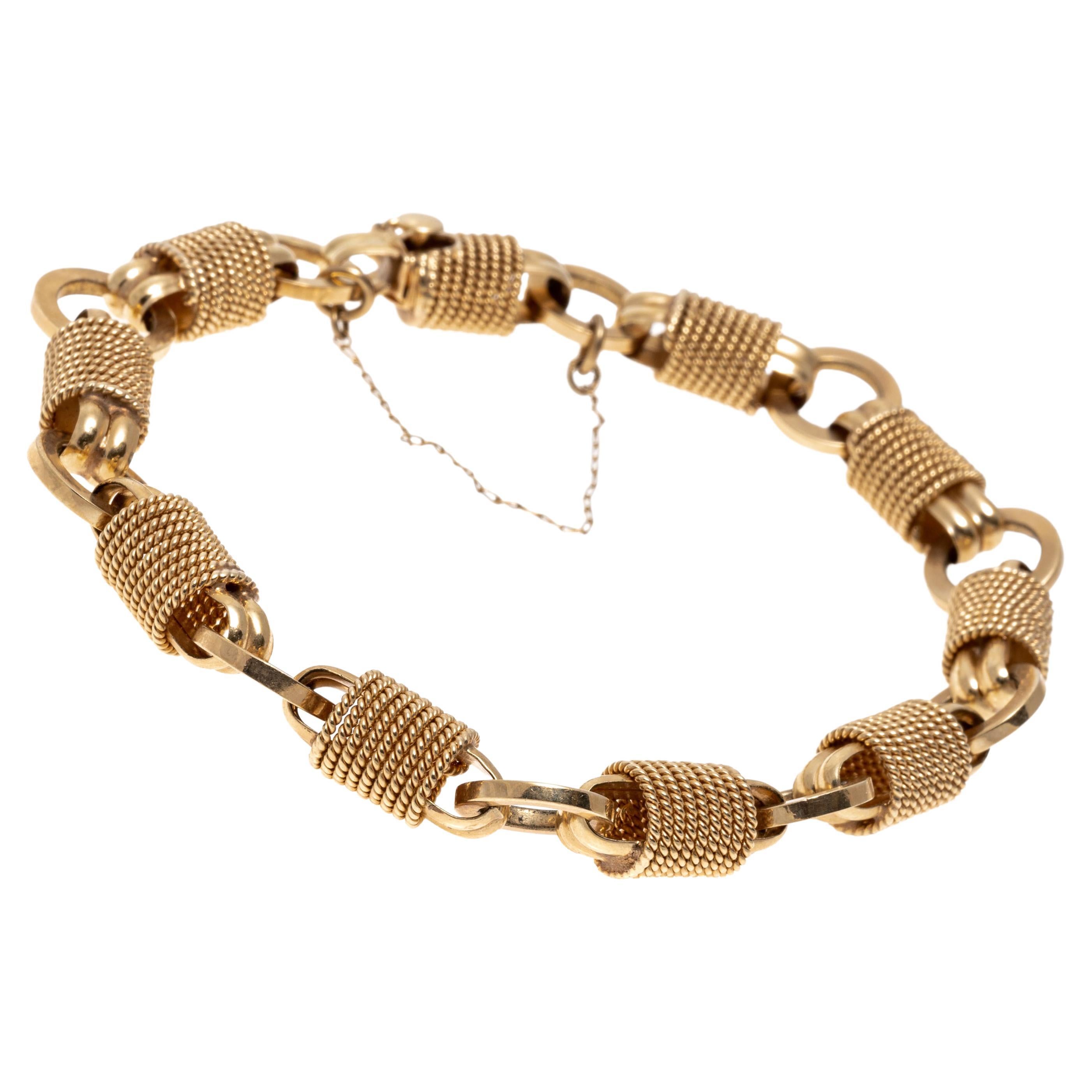 Gliederarmband aus 18 Karat Gold mit Kette