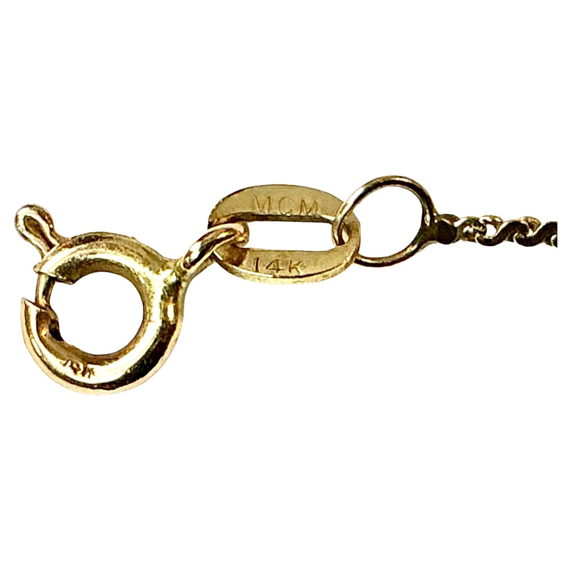 Cadena de oro de 14 quilates con colgante en forma de cruz de oro de 10 quilates y diamantes en venta 1
