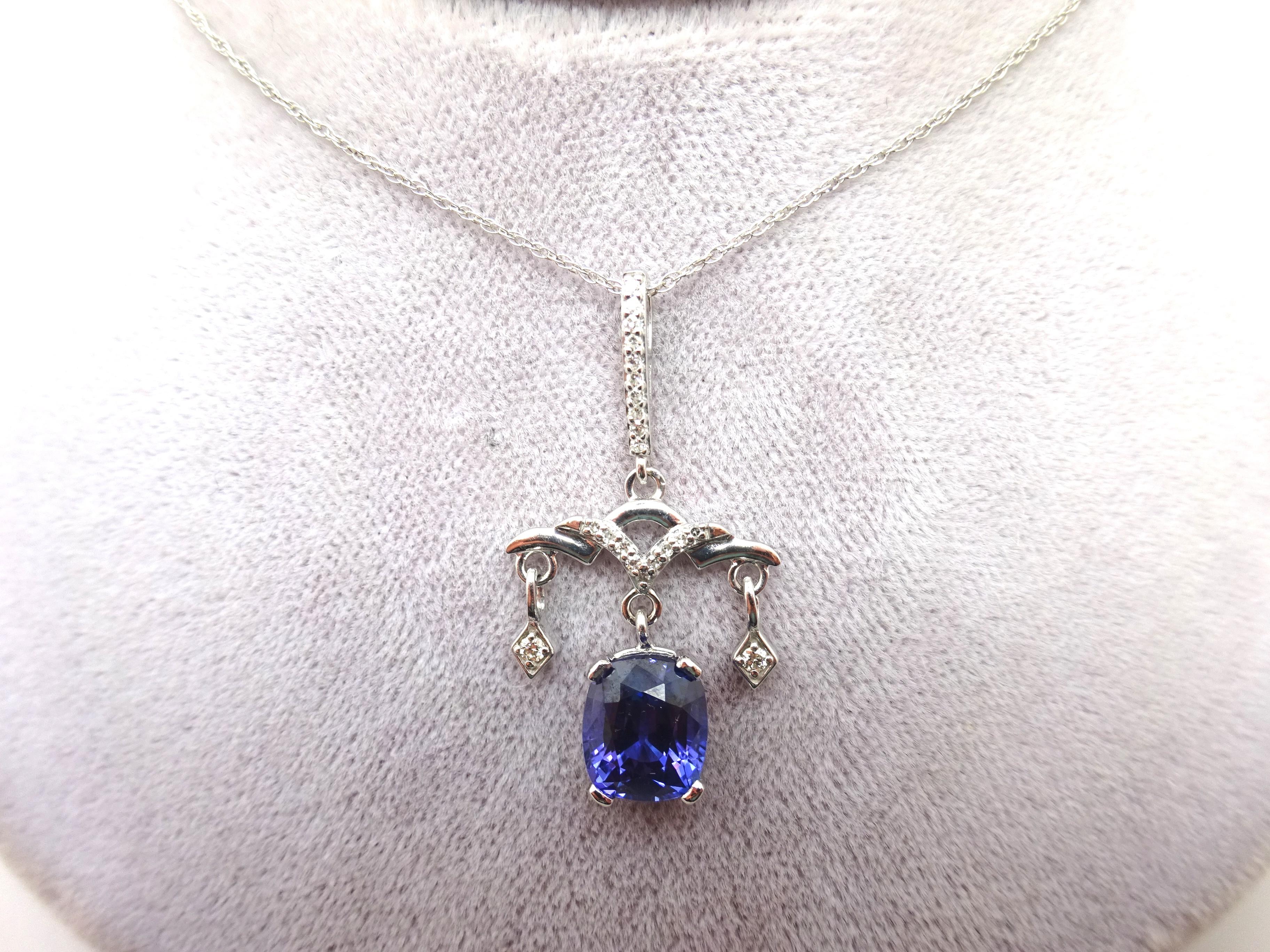 14k Gold Chandelier 2.30ct Genuine Natural Tanzanite Pendant w/Diamonds (#C3757)

Enticing 14k white gold pendant featuring a gorgeous tanzanite and diamonds in a chandelier style. The tanzanite is oval shaped weighting approximately 2.30 carats and