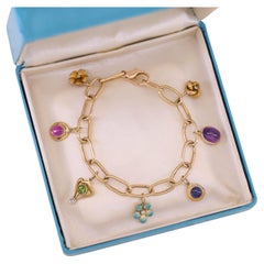 14 Karat Gold Charm-Armband mit 7 antiken Anhängern
