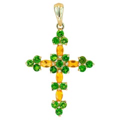 Cross pendant with colored gemstones in 14k gold