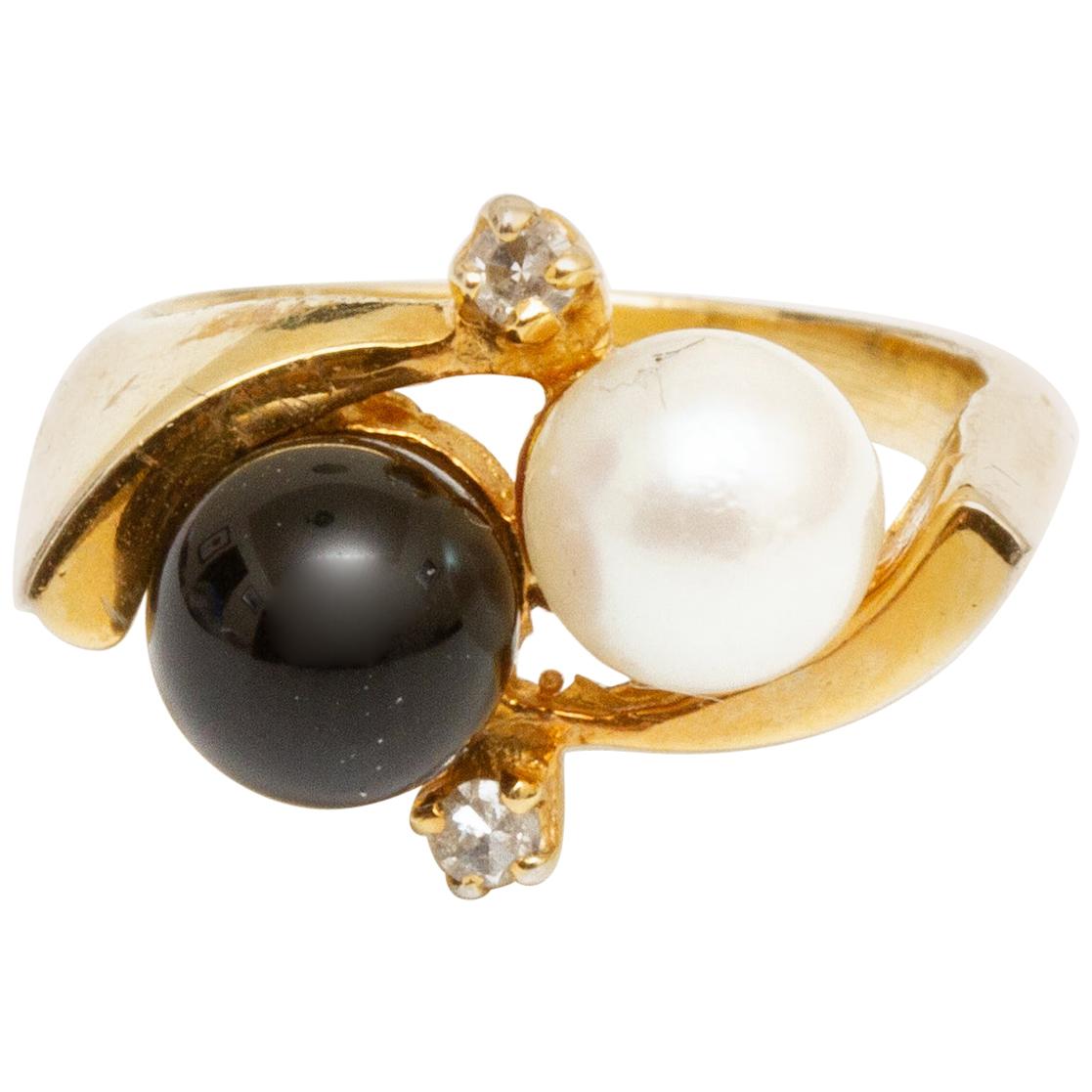 14 Karat Gold Cultured Pearl, Black Onyx and Diamond Ring