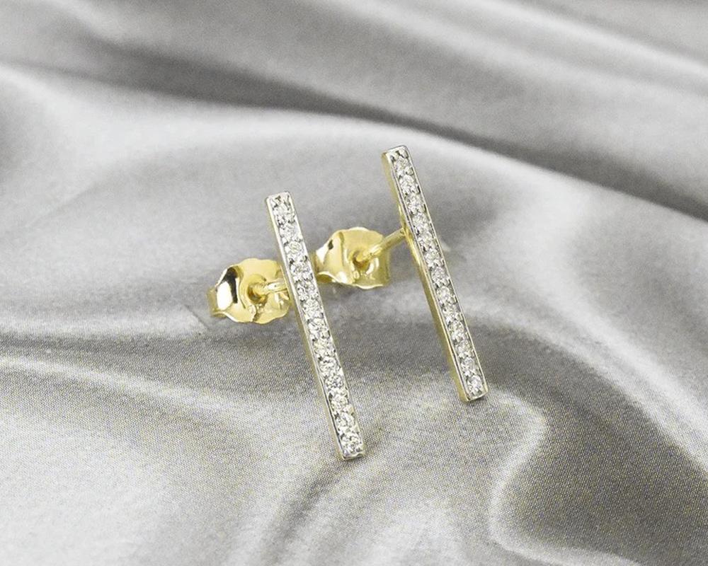 Long Diamond Bar Earrings are made of 14K solid gold.
Available in three colors of gold: White Gold / Rose Gold / Yellow Gold.  

These Dainty Bar Earrings 15 mm. Long in 14K Gold featuring shiny brilliant round cut natural diamonds set by master