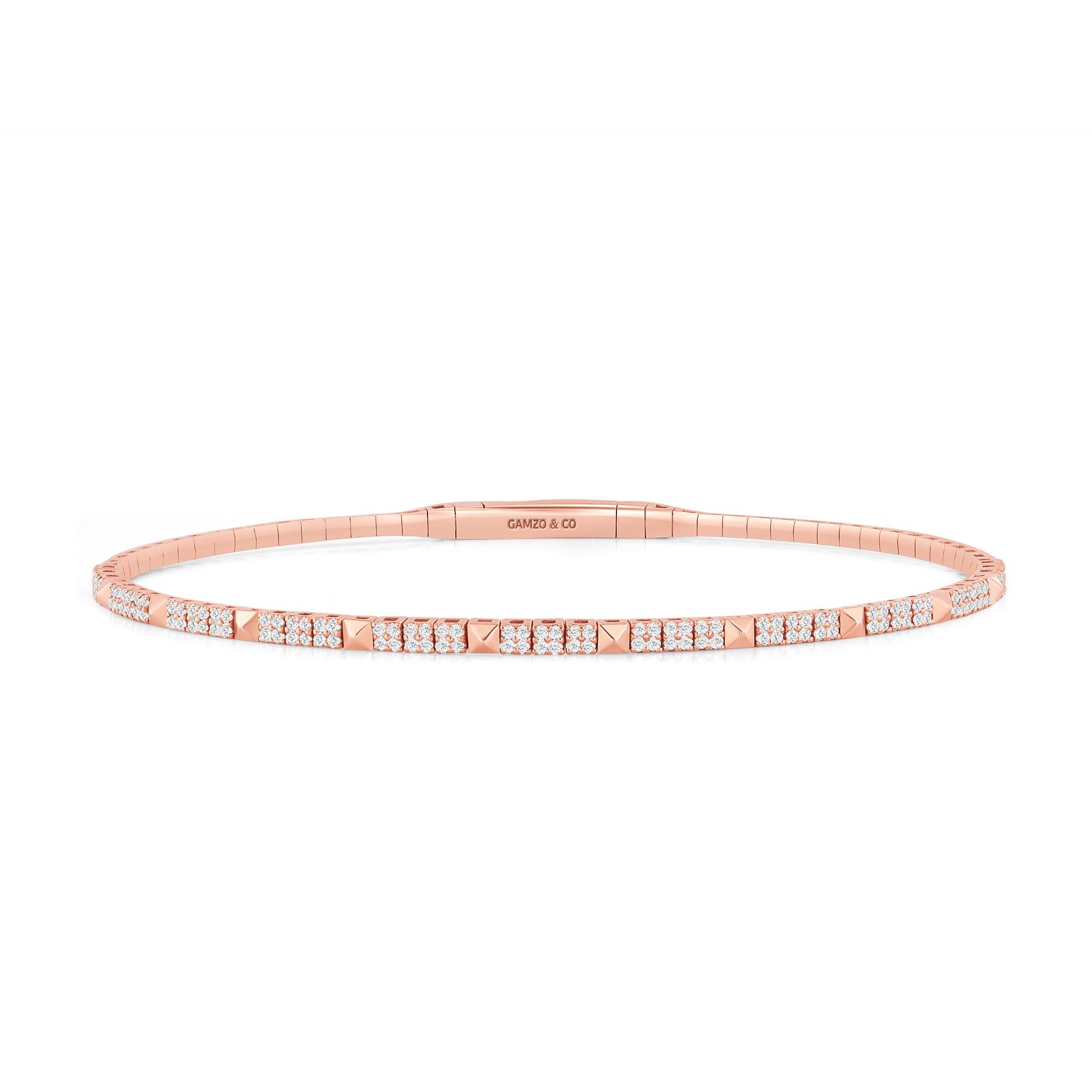 This diamond tennis bangle features beautifully cut round diamonds set gorgeously in 14k gold.

Metal: 14k Gold
Diamond Cut: Round Natural Diamond (Not Lab Grown)
Total Diamond Carats: 0.80 Carats
Diamond Clarity: VS
Diamond Color: F-G
Color: Rose