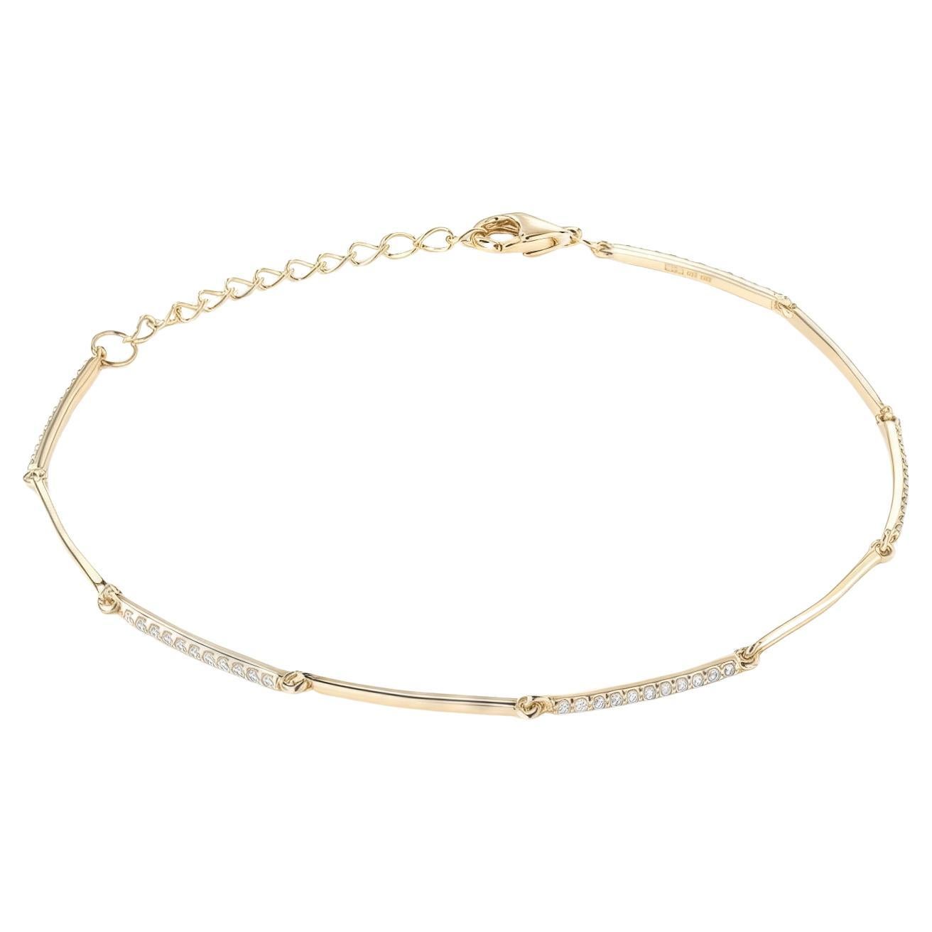 Bracelet à barre torsadée en or 14K avec chaîne de diamants