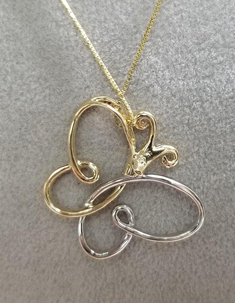 Colgante de oro de 14 quilates con diamantes 