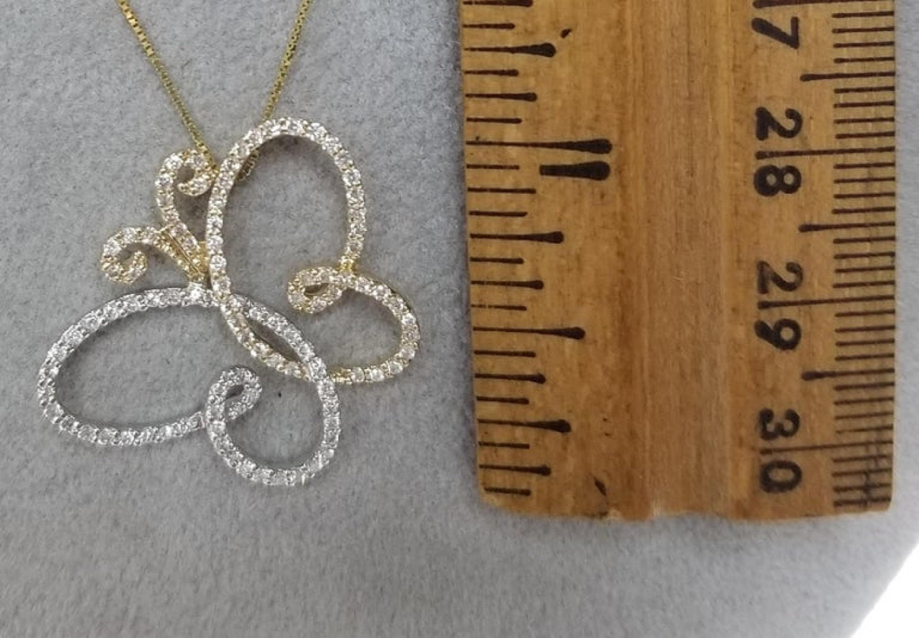 Colgante de oro de 14 quilates con diamantes 