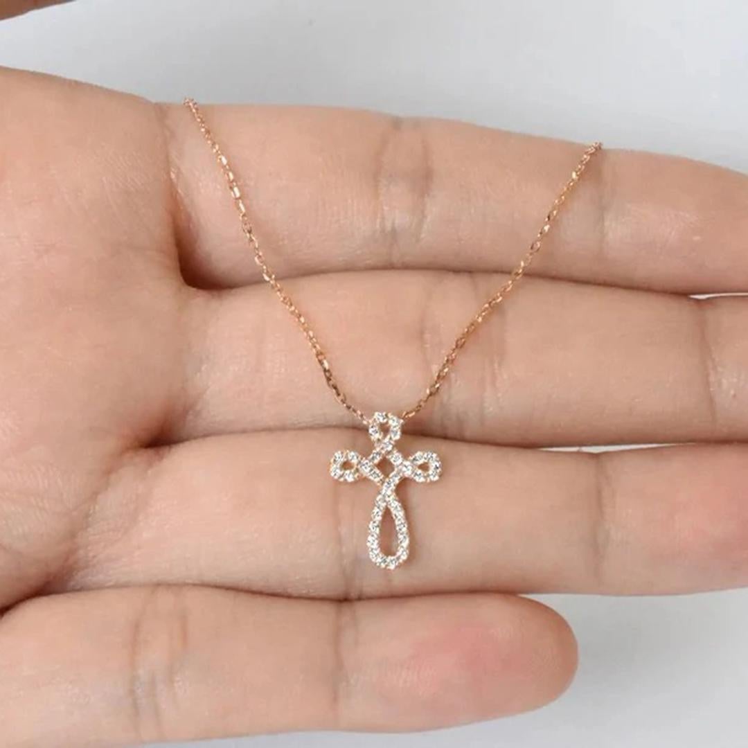 Diamond Cross Necklace is made of 14k solid gold available in three colors of gold, Rose Gold / White Gold / Yellow Gold.

Natural genuine round cut diamond each diamond is hand selected by me to ensure quality and set by a master setter in our