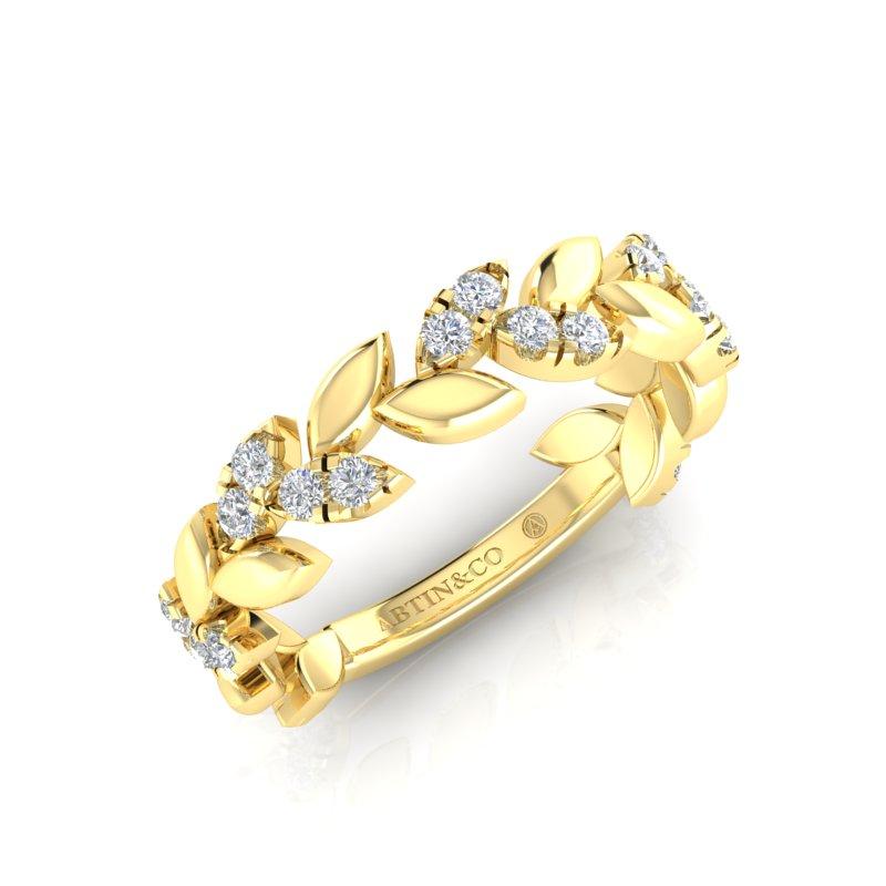 Crafted with 14K Gold in yellow, rose, and white, this beautifully sculpted leaf ring has round brilliant diamonds that go three quarters around. This ring is stunning as a wedding band on its own or stacked together with other rings. It makes the