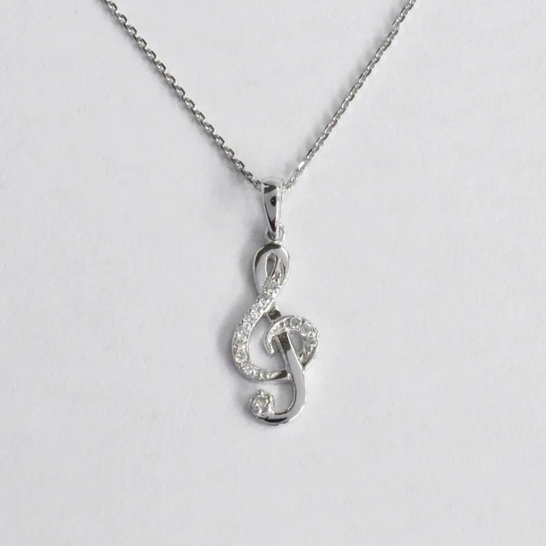 gold treble clef necklace