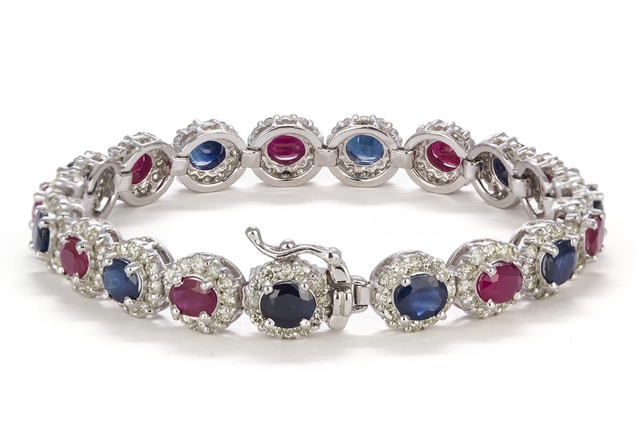 Oval Cut 14 Karat Gold Diamond, Ruby and Sapphire Bracelet