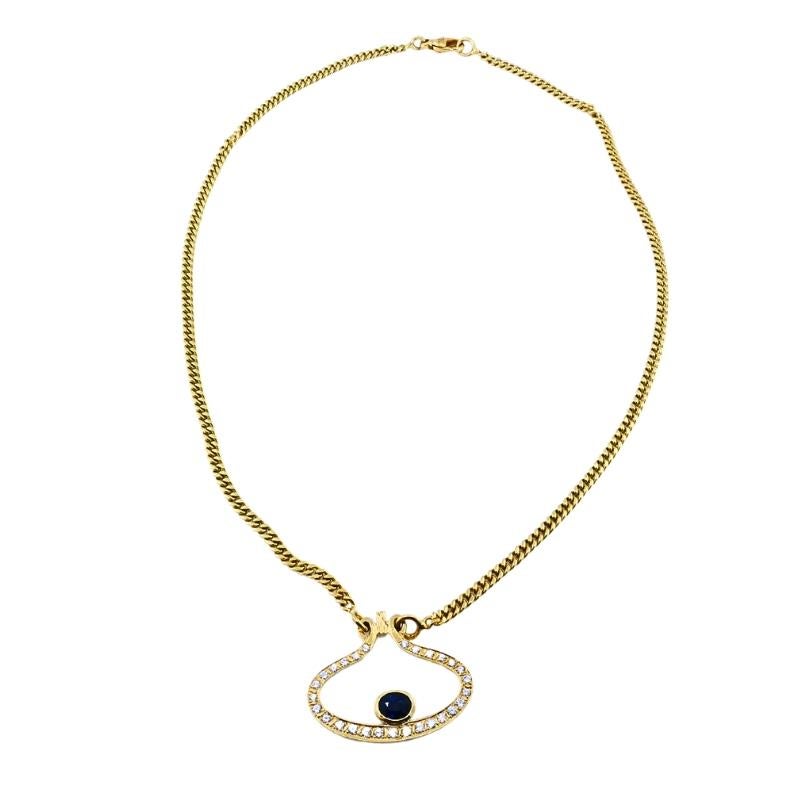 Collana con ciondolo in oro 14k con diamante e zaffiro Motivo occhio In condizioni buone in vendita a Beverly Hills, CA