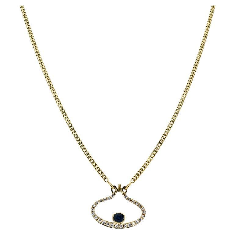 Collana con ciondolo in oro 14k con diamante e zaffiro Motivo occhio in vendita