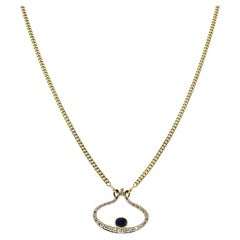 Collier en or 14k avec diamant et saphir Motif de l'oeil