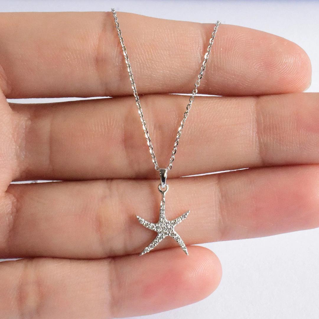 Delicate Dainty Starfish Charm Necklace is made of 14k solid gold.
Available in three colors of gold: White Gold / Rose Gold / Yellow Gold.

Natural genuine round cut diamond each diamond is hand selected by me to ensure quality and set by a master