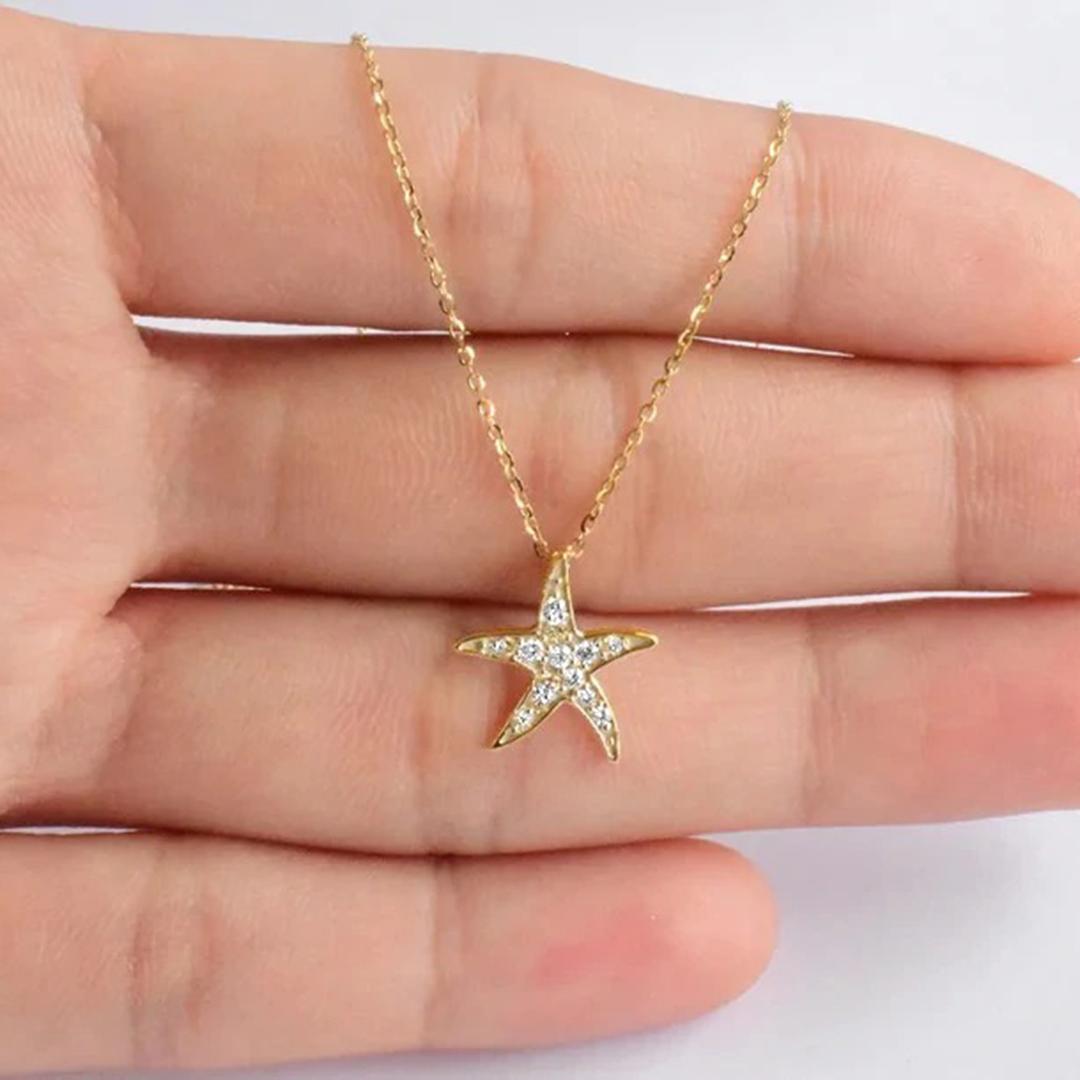 Delicate Dainty Starfish Charm Necklace with natural diamond is made of 14k solid gold.
Available in three colors of gold: White Gold / Rose Gold / Yellow Gold.

Lightweight and gorgeous natural genuine round cut diamond. Each diamond is hand