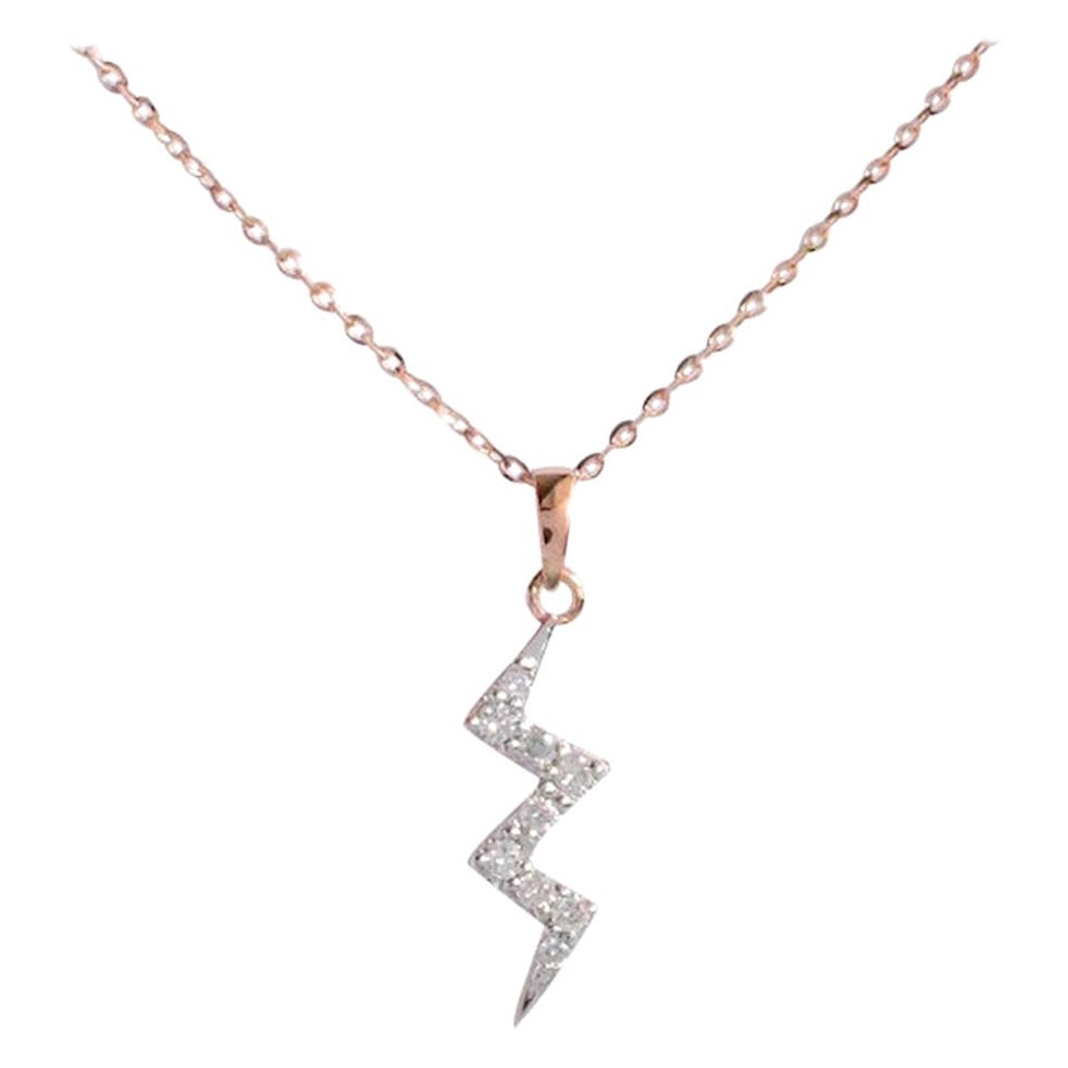 Diamond Thunderbolt Halskette ist aus 14 Karat massivem Gold gefertigt.
Erhältlich in drei Goldfarben: Roségold / Weißgold / Gelbgold.

Natürlicher, echter, rund geschliffener Diamant - jeder Diamant wird von mir von Hand ausgewählt, um die Qualität