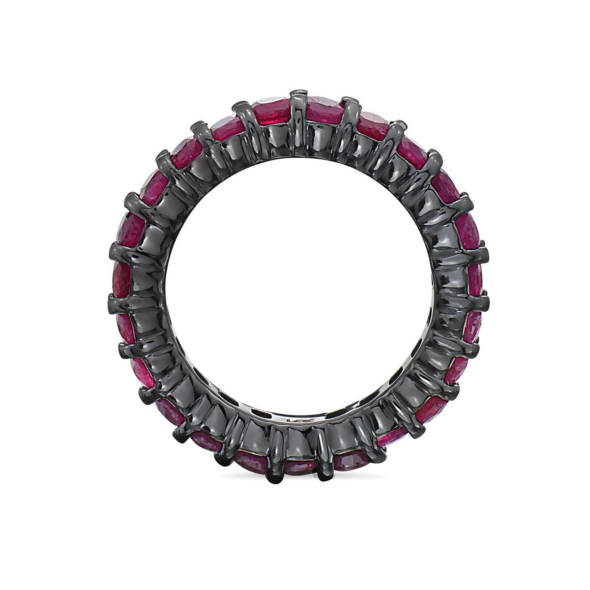 This 14K eternity band is dipped in black rhodium featuring 21 oval cut rubies weighing 4.5 carats carats. Size 6. 

Viewings available in our NYC showroom by appointment.