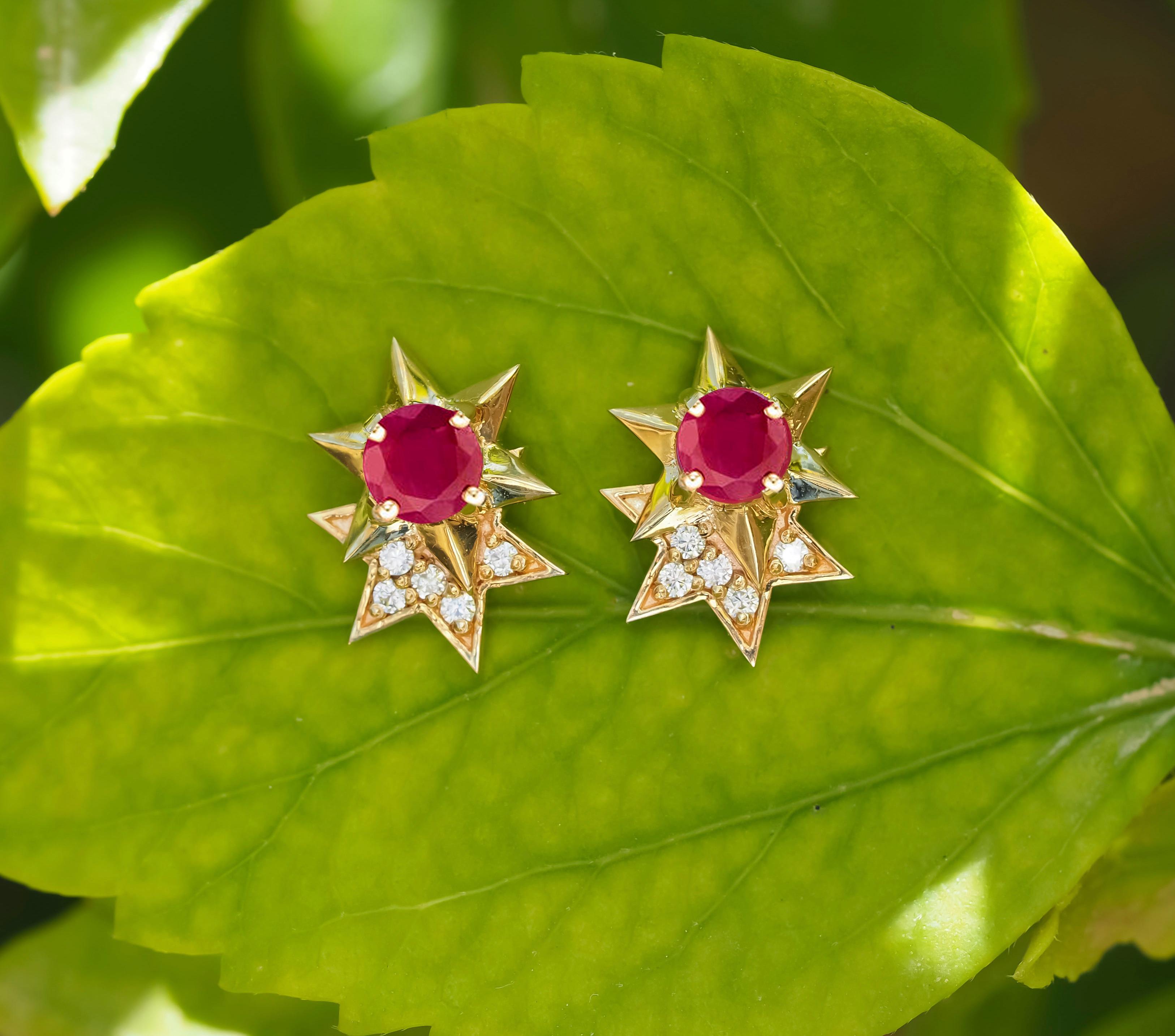 14 karat gold earrings studs with genuine rubies and diamonds. July birthstone.
Metal: 14 karat gold
Weight: 1.95 g.
Size: 12 x 9.5 mm.
Central stones: 
Genuine rubies: weight - 0.45 ct x 2 = 0.90 ct total.
Ruby color, round cut, clarity good -