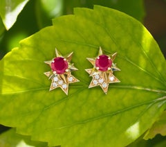 Double star ruby earrings in 14k gold